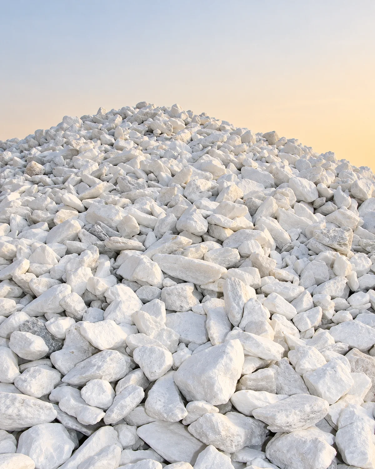 Afghan-origin talc stockpile under a warm sky